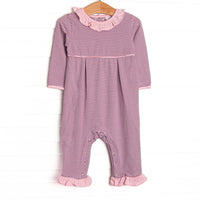  This romper features soft knit material, sweet purple stripes, and snaps in the stride to make changing a breeze. 