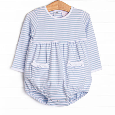  This cozy knit favorite is a staple for every little girl's closet. Featured here in light blue stripes and ruffle trimmed pockets add adorable details! 