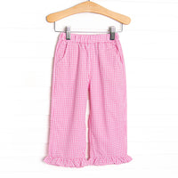  This straight leg pant with a ruffle hem comes in pink and blue gingham. 