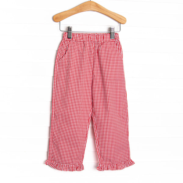  This straight leg pant with a ruffle hem comes in red gingham. 