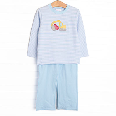  This set features a blue striped print, an excavator applique, and blue pants to match. 