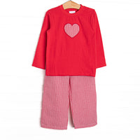 This set features a red top, a red gingham heart appliques, and red gingham pants to match.
