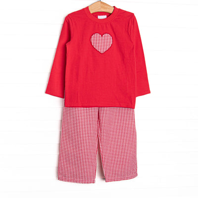 This set features a red top, a red gingham heart appliques, and red gingham pants to match.