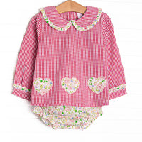  This set features a red mini gingham print, a peter pan collar with ruffle trim, and floral heart appliques. Coordinating floral diaper cover to match. 