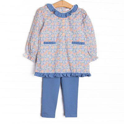  This set features a blue floral print, blue ruffle trim, and floral embroidery . Coordinating blue leggings to match. 