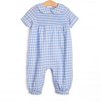 This romper features a blue gingham print, peter pan collar, and elastic smocking across the chest!