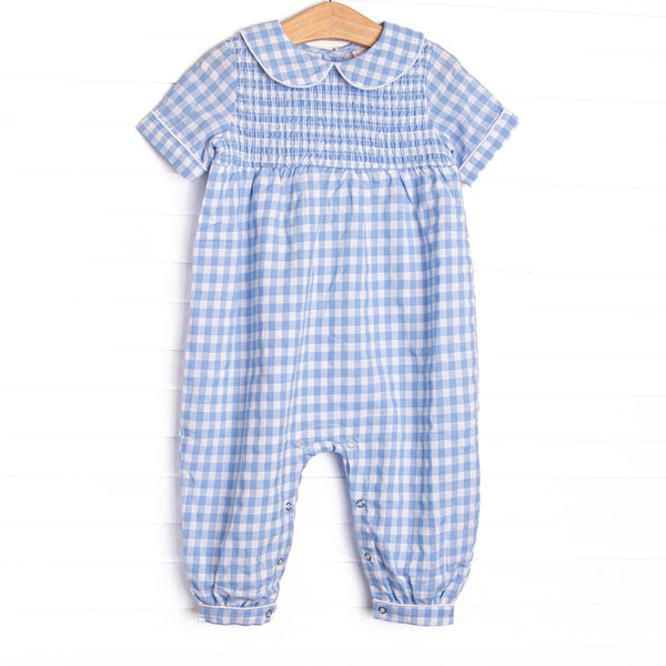 This romper features a blue gingham print, peter pan collar, and elastic smocking across the chest!