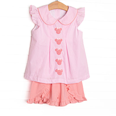 This set features pink gingham fabric, mouse embroidery, flutter sleeves, and a Peter Pan collar. Coordinating ruffle shorts to match.