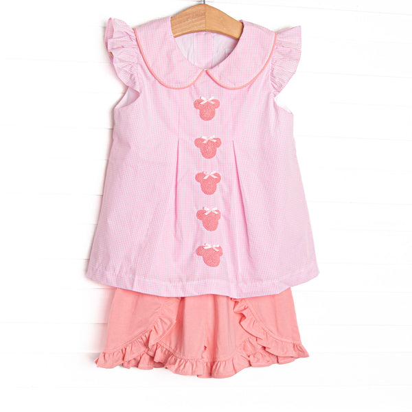 This set features pink gingham fabric, mouse embroidery, flutter sleeves, and a Peter Pan collar. Coordinating ruffle shorts to match.