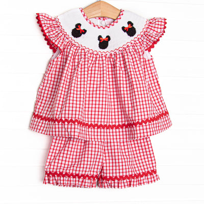  This set features red windowpane fabric, mouse trio&nbsp; smocking, flutter sleeves, and red ric rac trim. Coordinating shorts to match. 