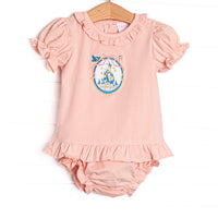  This set features a pink knit material, a framed castle embroidery, and ruffle trim. Coordinating diaper cover to match. 