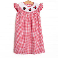  This dress features red windowpane fabric, mouse trio&nbsp; smocking, flutter sleeves, and red ric rac trim. 