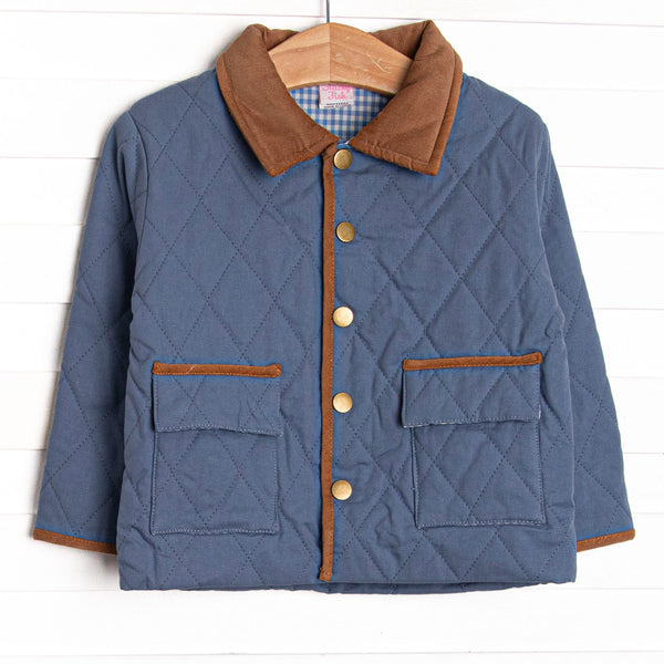 This coat features a denim quilted material, brown collar and trim, and light blue gingham lining.