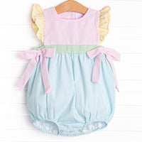 This bubble features precious pastel seersuckers, flutter sleeves, and bows on the sides. 