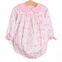  This bubble features pink ballerina printed fabric, a pink Peter Pan collar, and long sleeves. 