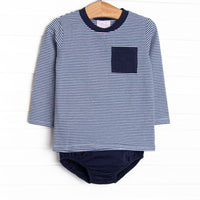  The set features soft knit material, a front pocket, and a coordinating diaper cover. 
