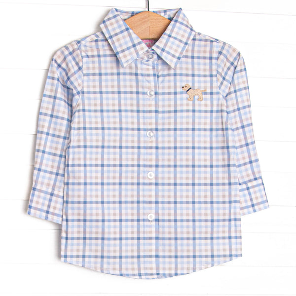  This shirt features a blue plaid print, a button down front, and a puppy embroidery. 