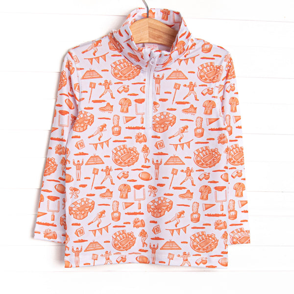 This pullover features an orange football themed print, a quarter zipper, and the best performance fabric.