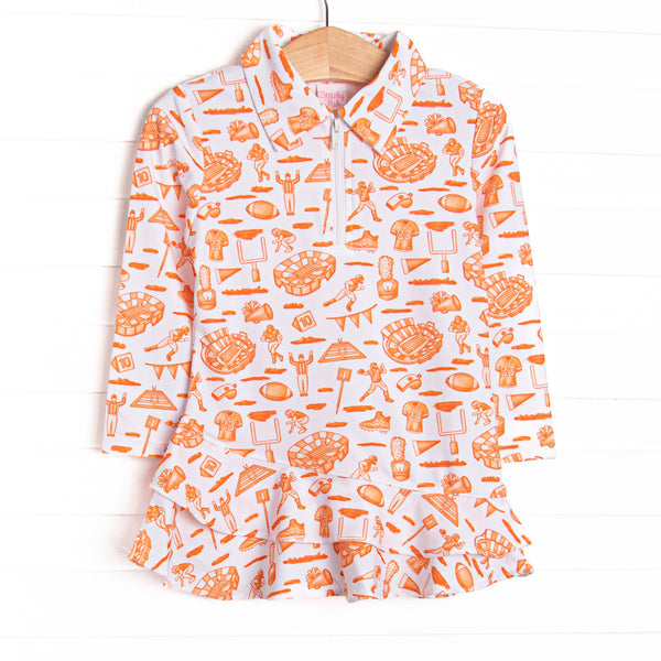 This tennis dress features an orange football themed print, a ruffle layered bottom, and the best performance fabric