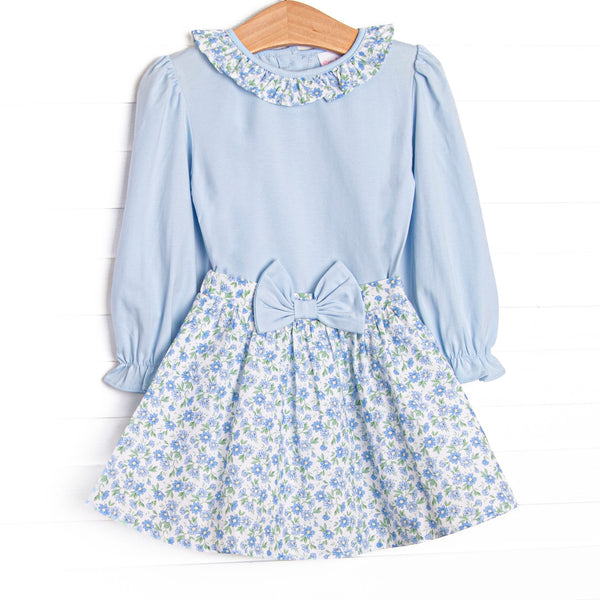  This&nbsp;set&nbsp;features a blue floral print, a ruffle collar, and a coordinating floral skirt to match. 