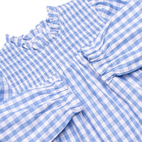 This set features a smocking across the top, a blue check print, and matching diaper cover.