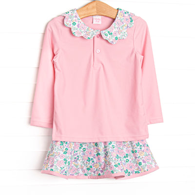  This set features a pink floral print, a floral ruffle collar, and the best performance fabric. 