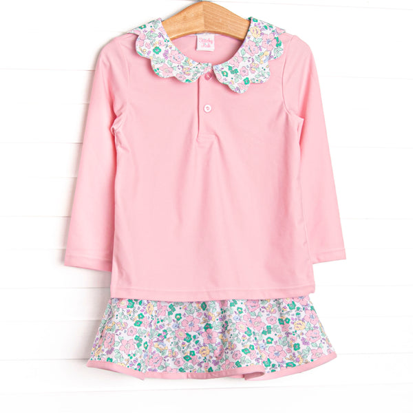  This set features a pink floral print, a floral ruffle collar, and the best performance fabric. 