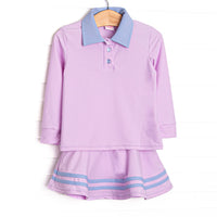 This set features a purple material, a blue collar, the best performance fabric, and a coordinating skort.