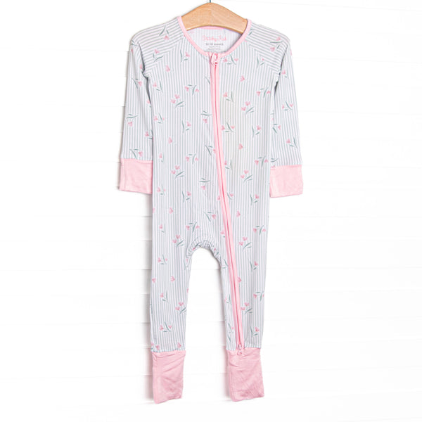 This zippy is made of the extremely soft, stretchy bamboo viscose fabric that feels like butter and features a green striped floral print.