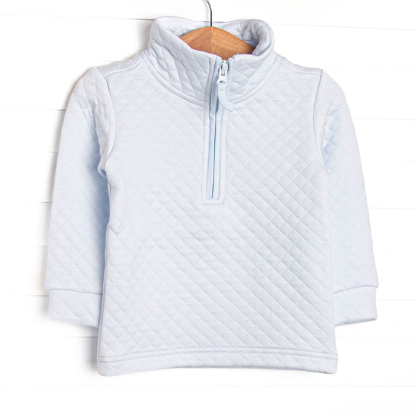  This pullover features a cozy quilted blue material, long sleeves, and a blue quarter zipper. 