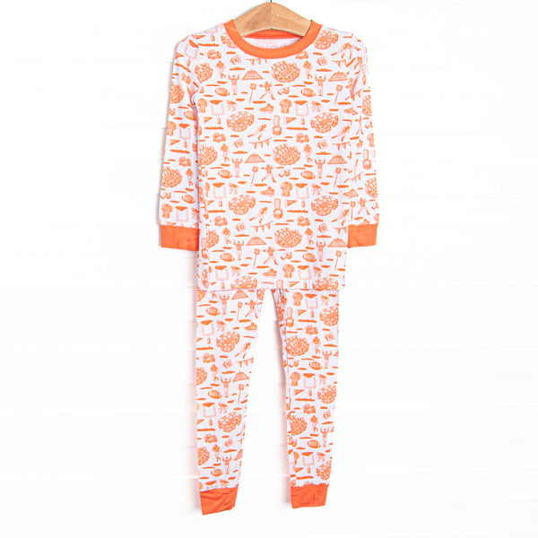 This set is made of the extremely soft, stretchy bamboo viscose fabric that feels like butter and features an orange football print.