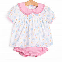 This set features a blue floral print, a pink eyelet lace trimmed collar, and short puff sleeves. Coordinating pink diaper cover to match.