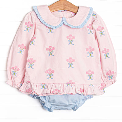  This set features pink corduroy fabric with rose embroidery, a ruffle trimmed Peter Pan collar, and ruffle trim. Coordinating blue diaper cover to match. 
