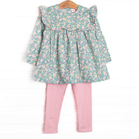  This set features a green floral print, a scalloped bib collar, and coordinating pink leggings to match. 