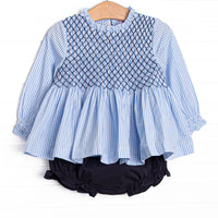 This set features blue gingham fabric, navy smocking, and long sleeves. Coordinating navy leggings to match.
