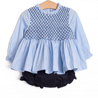 This set features blue gingham fabric, navy smocking, and long sleeves. Coordinating navy leggings to match.