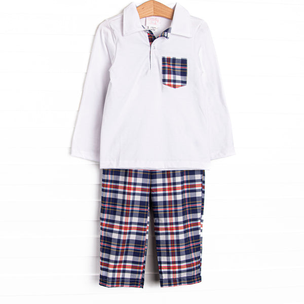 This set features a white top, a plaid pocket, and long sleeves. Coordinating navy and red plaid pants to match.