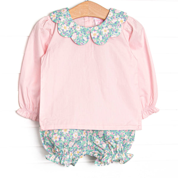 This set features a long sleeve pink top with a scalloped bib collar, and coordinating floral bloomers to match.