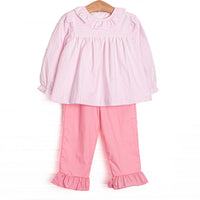 This set features pink windowpane fabric, a ruffle collar, and long sleeves. Coordinating pink ruffle pants to match.