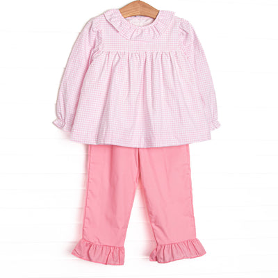 This set features pink windowpane fabric, a ruffle collar, and long sleeves. Coordinating pink ruffle pants to match.