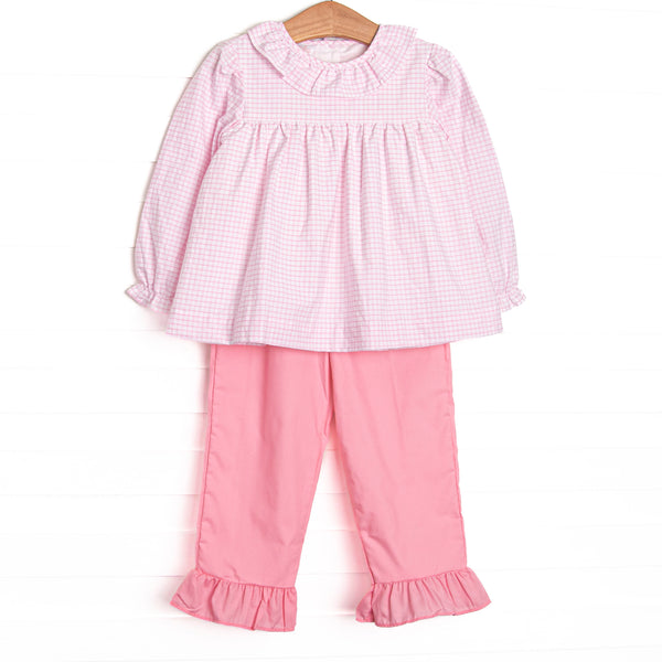 This set features pink windowpane fabric, a ruffle collar, and long sleeves. Coordinating pink ruffle pants to match.