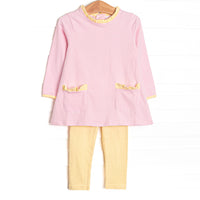 This set features a light pink stripes, front pocket, and yellow leggings.