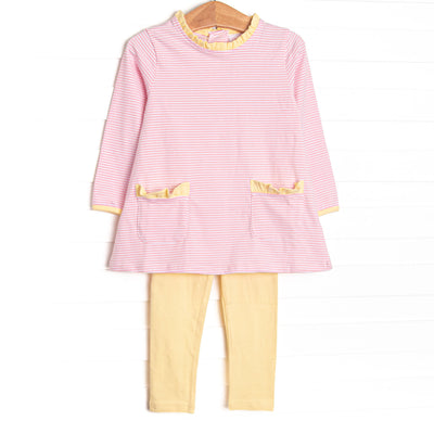 This set features a light pink stripes, front pocket, and yellow leggings.