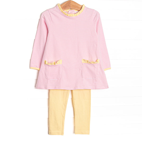 This set features a light pink stripes, front pocket, and yellow leggings.
