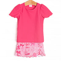  This set features a pink bow printed skort, a hot pink flutter sleeve top, and scallop edge embroidery. 