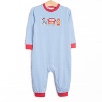 This romper features a blue striped knit material, fire truck and puppy applique, and red trim.