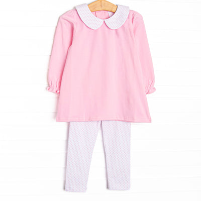 This set features pink knit fabric, bitty dot leggings, and a white peter pan collar.
