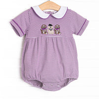 This bubble features purple striped knit material, puppy football applique, and a white peter pan collar.