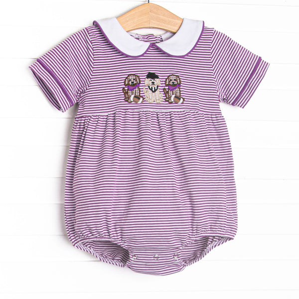 This bubble features purple striped knit material, puppy football applique, and a white peter pan collar.