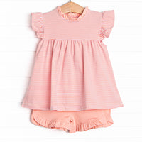  The set features a peach striped flutter sleeve top, the softest knit material, and mint ruffle shorts to match. 